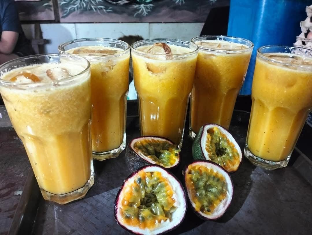 Fresh passion fruit juice served in glass made from farm-grown passion fruits on Bolaven Plateau